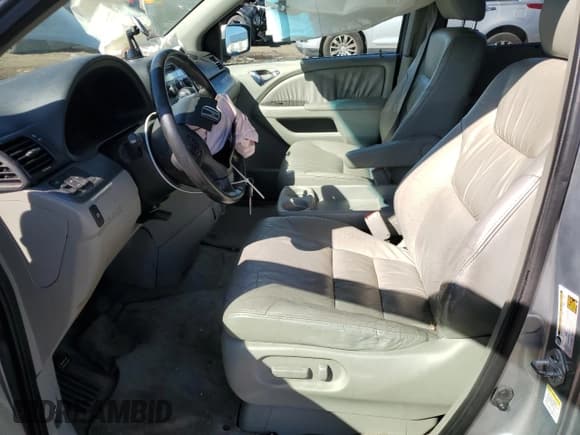 ✅ 2007 Honda Odyssey EX-L • VIN: 5FNRL38627B111556 • Lot: 85679515. Wystawiony na Copart z przebiegiem 263 715 mil. Bezpłatny archiwum sprzedaży aukcyjnych z USA i szczegółowy raport historii pojazdu na DreamBid. Zdjęcie 7.