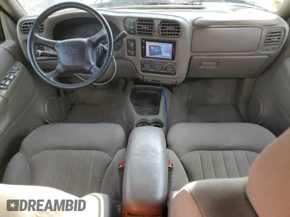 2004 Chevrolet Blazer LS z VIN 1GNDT13X54K134480, wystawiony jako Copart lot #82024914 z przebiegiem 219 210 mil mil oraz Szkoda całkowita • Salvage title. Historia ofert i sprzedaży dostępna na DreamBid. Obrazek 8.