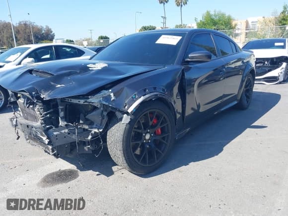 ✅ 2020 Dodge Charger Scat Pack • VIN: 2C3CDXGJ7LH183040 • Lot: 41965465. Listed on IAAI with 74,912 mi. Free auction sales archive from the USA and detailed vehicle history report at DreamBid. Image 2.