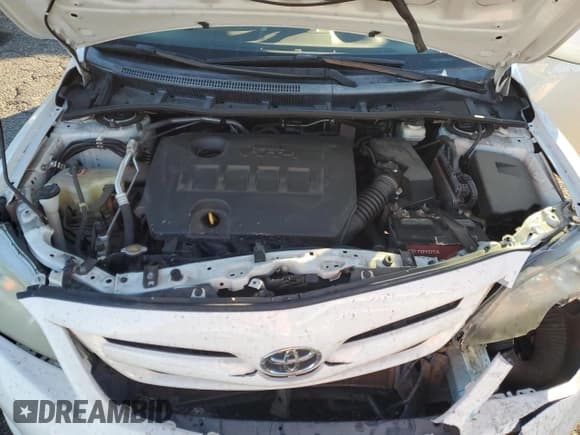 ✅ 2013 Toyota Corolla L • VIN: 5YFBU4EE0DP205354 • Lot: 92176175. Listed on Copart with 131,743 mi. Free auction sales archive from the USA and detailed vehicle history report at DreamBid. Image 11.