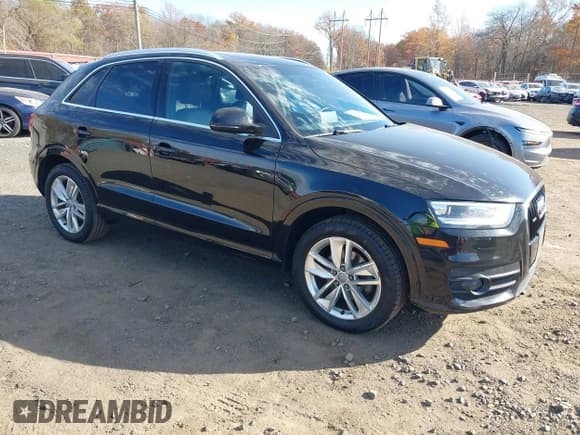 ✅ 2015 Audi Q3 Prestige • VIN: WA1GFCFS9FR004358 • Lot: 43604261. Listed on IAAI with 81,990 mi. Free auction sales archive from the USA and detailed vehicle history report at DreamBid. Image 1.