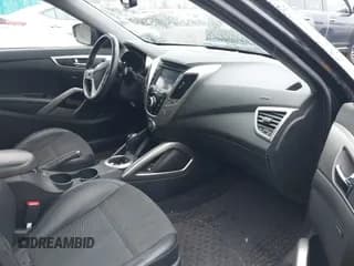 ✅ 2013 Hyundai Veloster w/Black Int • VIN: KMHTC6AD1DU145647 • Lot: 41591140. Wystawiony na IAAI z przebiegiem 115 577 mil. Bezpłatny archiwum sprzedaży aukcyjnych z USA i szczegółowy raport historii pojazdu na DreamBid. Zdjęcie 5.