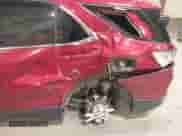 2018 Chevrolet Equinox LT z VIN 2GNAXSEVXJ6112062, wystawiony jako IAAI lot #43406177 z przebiegiem 69 608 mil mil oraz . Historia ofert i sprzedaży dostępna na DreamBid. Obrazek 6.