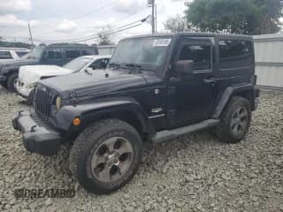 ✅ 2011 Jeep Wrangler Sahara • VIN: 1J4AA5D19BL638812 • Lot: 68199105. Listed on Copart with 152,106 mi. Free auction sales archive from the USA and detailed vehicle history report at DreamBid. Image 1.
