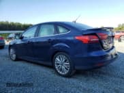 ✅ 2016 Ford Focus Titanium • VIN: 1FADP3J27GL357558 • Lot: 71401025. Listed on Copart with 197,483 mi. Free auction sales archive from the USA and detailed vehicle history report at DreamBid. Image 2.