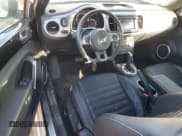 ✅ 2014 Volkswagen Beetle 2.0L TDI • VIN: 3VW5L7ATXEM816360 • Lot: 45589285. Listed on Copart with 78,758 mi. Free auction sales archive from the USA and detailed vehicle history report at DreamBid. Image 8.