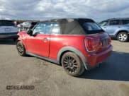 ✅ 2017 MINI Convertible Cooper • VIN: WMWWG5C35H3C98970 • Лот: 91039495. Опубликован ранее на Copart с пробегом 75 190 миль. Бесплатный доступ к архиву аукционных продаж из США и подробный отчёт об истории автомобиля на DreamBid. Изображение 2.