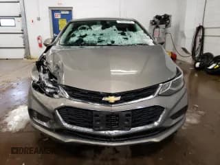 ✅ 2018 Chevrolet Cruze LT • VIN: 3G1BE6SM5JS593547 • Lot: 70024232. Listed on Copart with 22,114 mi. Free auction sales archive from the USA and detailed vehicle history report at DreamBid. Image 5.