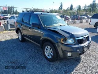 ✅ 2009 Mazda Tribute Touring • VIN: 4F2CZ92749KM09296 • Lot: 42652957. Listed on IAAI with 183,154 mi. Free auction sales archive from the USA and detailed vehicle history report at DreamBid. Image 1.