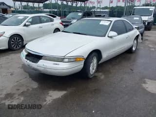 ✅ 1996 Lincoln Mark VIII • VIN: 1LNLM91V5TY614592 • Лот: 42705943. Опубликован ранее на IAAI с пробегом 84 547 миль. Бесплатный доступ к архиву аукционных продаж из США и подробный отчёт об истории автомобиля на DreamBid. Изображение 2.