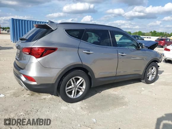 ✅ 2018 Hyundai Santa Fe 2.4L • VIN: 5XYZU3LB2JG511912 • Лот: 44390174. Опубликован ранее на Copart с пробегом 74 835 миль. Бесплатный доступ к архиву аукционных продаж из США и подробный отчёт об истории автомобиля на DreamBid. Изображение 3.