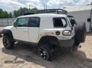 ✅ 2012 Toyota FJ Cruiser • VIN: JTEBU4BFXCK125534 • Lot: 68251134. Listed on Copart with 131,151 mi. Free auction sales archive from the USA and detailed vehicle history report at DreamBid. Image 2.