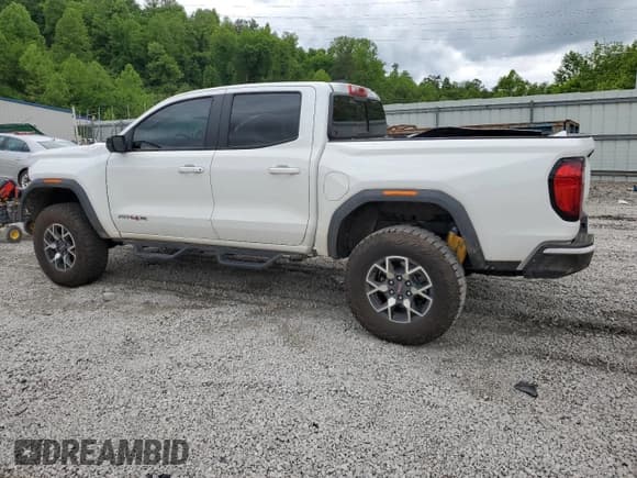 ✅ 2024 GMC Canyon 4WD AT4X • VIN: 1GTP6EEK7R1285601 • Лот: 57564425. Опубликован ранее на Copart с пробегом 11 085 миль. Бесплатный доступ к архиву аукционных продаж из США и подробный отчёт об истории автомобиля на DreamBid. Изображение 2.