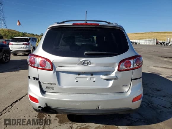 ✅ 2012 Hyundai Santa Fe Limited • VIN: 5XYZHDAG8CG120419 • Lot: 64593604. Listed on Copart with 94,740 mi. Free auction sales archive from the USA and detailed vehicle history report at DreamBid. Image 6.