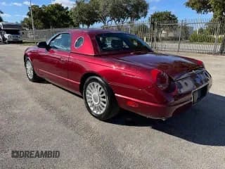 ✅ 2004 Ford Thunderbird Deluxe • VIN: 1FAHP60A54Y110954 • Лот: 71134015. Опубликован ранее на Copart с пробегом 26 244 миль. Бесплатный доступ к архиву аукционных продаж из США и подробный отчёт об истории автомобиля на DreamBid. Изображение 2.