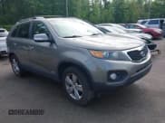 ✅ 2013 Kia Sorento EX • VIN: 5XYKUDA65DG413913 • Lot: 42256920. Listed on IAAI with 115,829 mi. Free auction sales archive from the USA and detailed vehicle history report at DreamBid. Image 1.