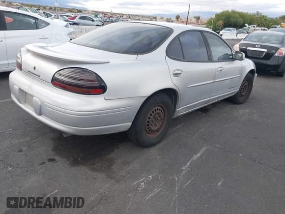 ✅ 2001 Pontiac Grand Prix SE • VIN: 1G2WK52J11F216496 • Lot: 43736970. Listed on IAAI with 229,153 mi. Free auction sales archive from the USA and detailed vehicle history report at DreamBid. Image 4.