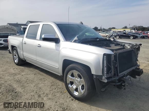 ✅ 2017 Chevrolet Silverado 1500 LT • VIN: 3GCPCREC4HG165585 • Лот: 89687015. Опубликован ранее на Copart с пробегом Не указан. Бесплатный доступ к архиву аукционных продаж из США и подробный отчёт об истории автомобиля на DreamBid. Изображение 4.