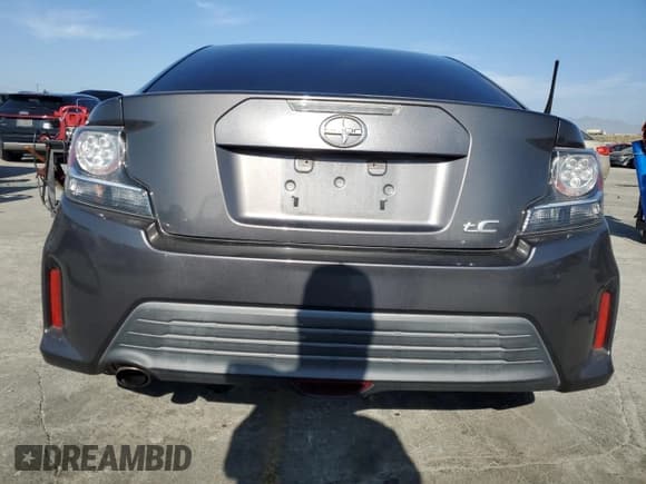 ✅ 2015 Scion tC • VIN: JTKJF5C74FJ004069 • Lot: 90932395. Wystawiony na Copart z przebiegiem 89 822 mil. Bezpłatny archiwum sprzedaży aukcyjnych z USA i szczegółowy raport historii pojazdu na DreamBid. Zdjęcie 6.