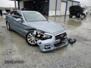 ✅ 2015 Infiniti Q50 Premium • VIN: JN1BV7AP6FM352695 • Lot: 90315095. Listed on Copart with 99,519 mi. Free auction sales archive from the USA and detailed vehicle history report at DreamBid. Image 13.