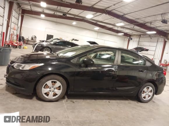 ✅ 2018 Chevrolet Cruze LS • VIN: 1G1BB5SM7J7131573 • Lot: 43507247. Listed on IAAI with 59,735 mi. Free auction sales archive from the USA and detailed vehicle history report at DreamBid. Image 14.