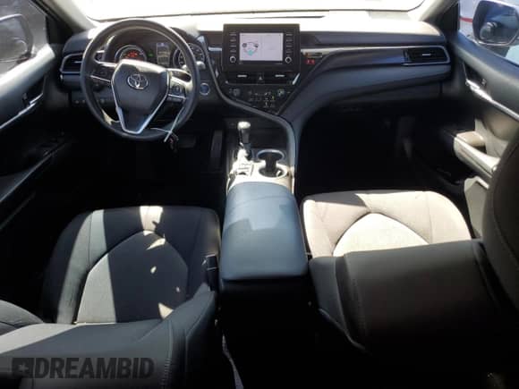 2021 Toyota Camry Hybrid LE with VIN 4T1C31AK5MU554381, listed as a Copart auction lot 69998775 with 104,313 mi miles and Salvage title. Bid and sale history available at DreamBid. Image 8.