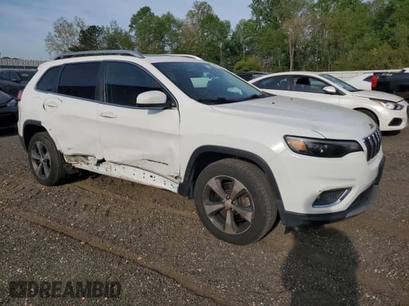 ✅ 2019 Jeep Cherokee Limited • VIN: 1C4PJMDX9KD258720 • Lot: 54375955. Listed on Copart with 77,108 mi. Free auction sales archive from the USA and detailed vehicle history report at DreamBid. Image 4.