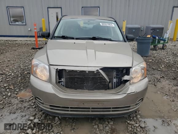 ✅ 2009 Dodge Caliber SXT • VIN: 1B3HB48AX9D259703 • Лот: 80551064. Опубликован ранее на Copart с пробегом 128 818 миль. Бесплатный доступ к архиву аукционных продаж из США и подробный отчёт об истории автомобиля на DreamBid. Изображение 5.