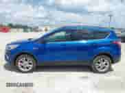 2018 Ford Escape SE z VIN 1FMCU9GD9JUA71170, wystawiony jako IAAI lot #42573258 z przebiegiem 102 170 mil mil oraz . Historia ofert i sprzedaży dostępna na DreamBid. Obrazek 14.