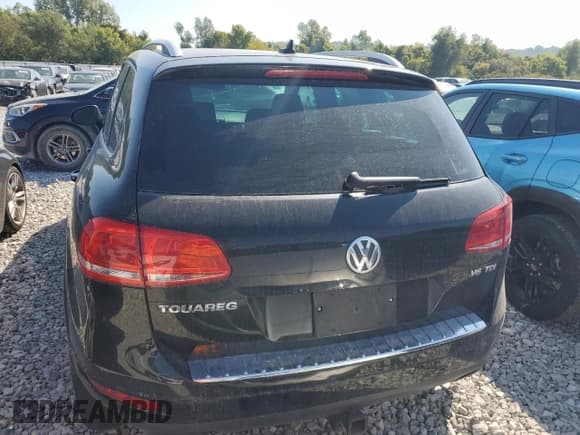 ✅ 2013 Volkswagen Touareg Sport • VIN: WVGEP9BP8DD013654 • Lot: 71978875. Wystawiony na Copart z przebiegiem 210 559 mil. Bezpłatny archiwum sprzedaży aukcyjnych z USA i szczegółowy raport historii pojazdu na DreamBid. Zdjęcie 6.