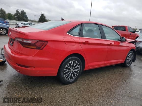 ✅ 2019 Volkswagen Jetta S • VIN: 3VWC57BU6KM081204 • Lot: 82762295. Wystawiony na Copart z przebiegiem 77 324 mil. Bezpłatny archiwum sprzedaży aukcyjnych z USA i szczegółowy raport historii pojazdu na DreamBid. Zdjęcie 3.