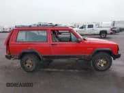 ✅ 1996 Jeep Cherokee Sport • VIN: 1J4FJ67S3TL213264 • Lot: 43252396. Listed on IAAI with 176,783 mi. Free auction sales archive from the USA and detailed vehicle history report at DreamBid. Image 14.