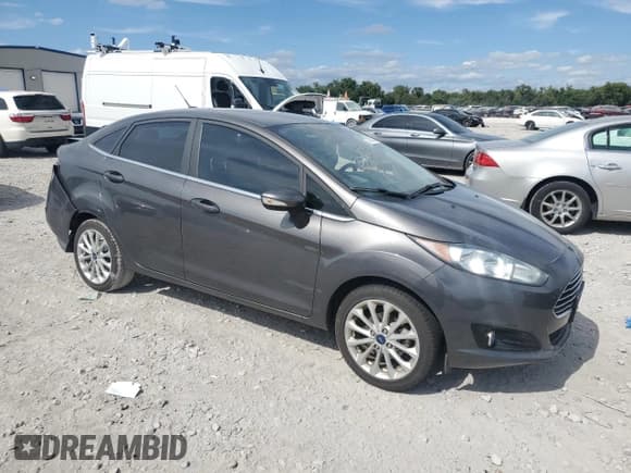 ✅ 2018 Ford Fiesta Titanium • VIN: 3FADP4CJ1JM109757 • Lot: 70323385. Listed on Copart with 40,404 mi. Free auction sales archive from the USA and detailed vehicle history report at DreamBid. Image 4.
