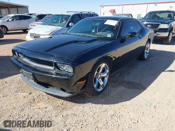✅ 2014 Dodge Challenger SXT • VIN: 2C3CDYAG4EH274188 • Lot: 41637423. Wystawiony na IAAI z przebiegiem 147 515 mil. Bezpłatny archiwum sprzedaży aukcyjnych z USA i szczegółowy raport historii pojazdu na DreamBid. Zdjęcie 17.