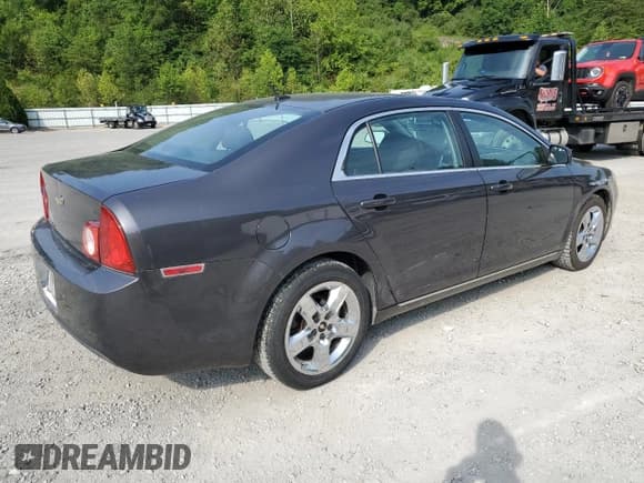 ✅ 2010 Chevrolet Malibu 1LT • VIN: 1G1ZC5EB6AF258908 • Lot: 64623004. Listed on Copart with 124,089 mi. Free auction sales archive from the USA and detailed vehicle history report at DreamBid. Image 3.