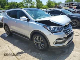 ✅ 2017 Hyundai Santa Fe Ultimate • VIN: 5XYZWDLA1HG411222 • Лот: 57331574. Опубликован ранее на Copart с пробегом 98 193 миль. Бесплатный доступ к архиву аукционных продаж из США и подробный отчёт об истории автомобиля на DreamBid. Изображение 4.