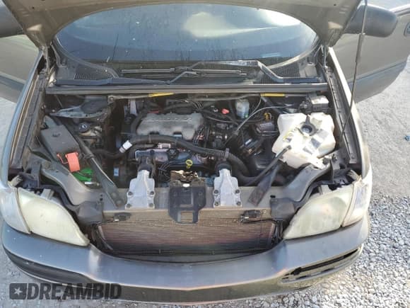 ✅ 2004 Chevrolet Venture LT • VIN: 1GNDX13E14D131003 • Lot: 80099484. Listed on Copart with Not provided. Free auction sales archive from the USA and detailed vehicle history report at DreamBid. Image 12.