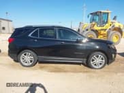 ✅ 2018 Chevrolet Equinox Premier • VIN: 2GNAXMEV2J6121057 • Lot: 43601678. Listed on IAAI with 115,263 mi. Free auction sales archive from the USA and detailed vehicle history report at DreamBid. Image 13.