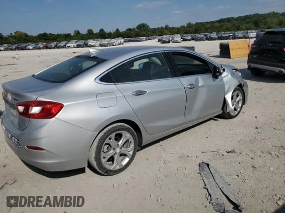 ✅ 2017 Chevrolet Cruze Premier • VIN: 1G1BF5SM7H7183980 • Lot: 71256005. Listed on Copart with 52,071 mi. Free auction sales archive from the USA and detailed vehicle history report at DreamBid. Image 3.