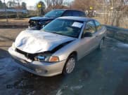 ✅ 2001 Mitsubishi Mirage DE • VIN: JA3AY11A91U038362 • Lot: 41363633. Listed on IAAI with 327,214 mi. Free auction sales archive from the USA and detailed vehicle history report at DreamBid. Image 2.