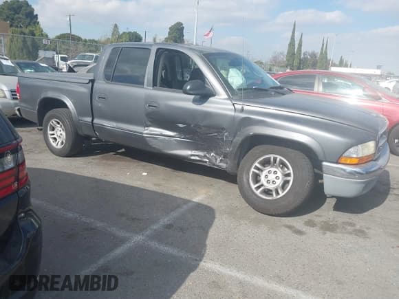 ✅ 2003 Dodge Dakota SLT • VIN: 1D7HL48N23S247441 • Lot: 41359296. Wystawiony na IAAI z przebiegiem 58 414 mil. Bezpłatny archiwum sprzedaży aukcyjnych z USA i szczegółowy raport historii pojazdu na DreamBid. Zdjęcie 13.