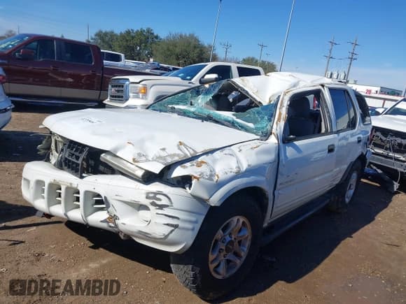 ✅ 2004 Isuzu Rodeo S • VIN: 4S2CK58W944315203 • Lot: 41355461. Listed on IAAI with Not provided. Free auction sales archive from the USA and detailed vehicle history report at DreamBid. Image 2.