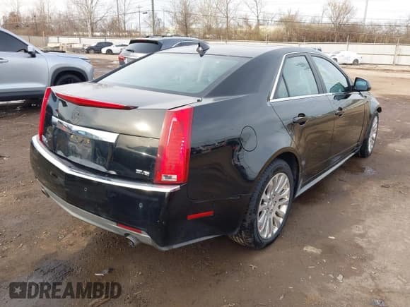 ✅ 2011 Cadillac CTS Premium • VIN: 1G6DS5ED7B0101210 • Lot: 41802027. Listed on IAAI with 127,701 mi. Free auction sales archive from the USA and detailed vehicle history report at DreamBid. Image 4.