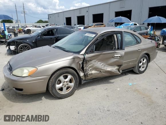 ✅ 2004 Ford Taurus SE • VIN: 1FAFP53U44A122559 • Lot: 55606595. Listed on Copart with Not provided. Free auction sales archive from the USA and detailed vehicle history report at DreamBid. Image 1.