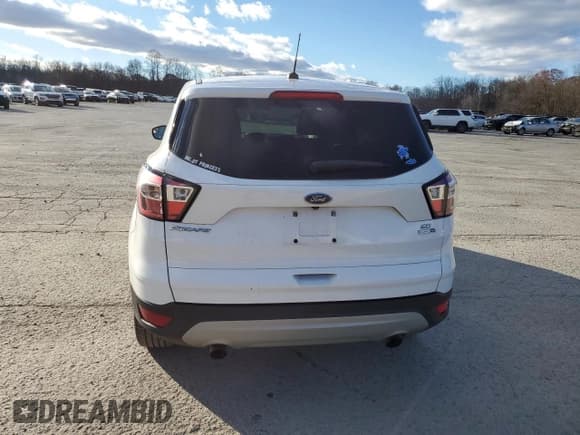 ✅ 2017 Ford Escape SE • VIN: 1FMCU9GD1HUD57136 • Lot: 93282615. Wystawiony na Copart z przebiegiem 100 104 mil. Bezpłatny archiwum sprzedaży aukcyjnych z USA i szczegółowy raport historii pojazdu na DreamBid. Zdjęcie 6.
