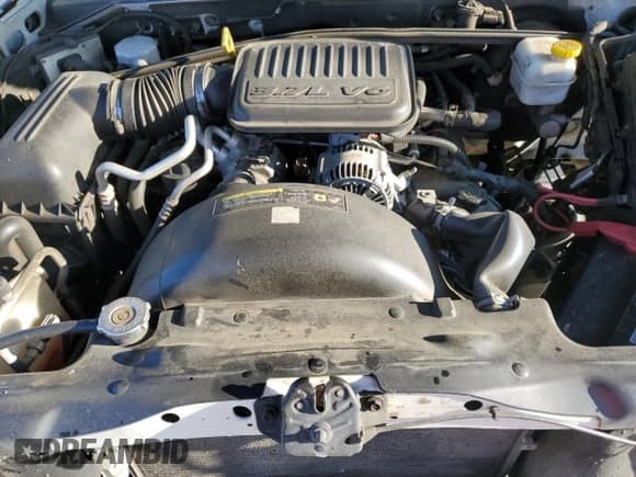 2005 Dodge Dakota SLT with VIN 1D7HE48K85S237791, listed as a Copart auction lot 73787444 with 154,958 mi miles and Salvage title. Bid and sale history available at DreamBid. Image 12.