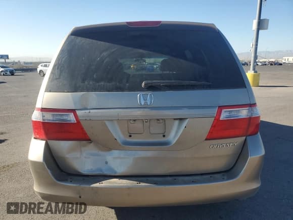 ✅ 2005 Honda Odyssey EX-L • VIN: 5FNRL38705B097212 • Лот: 92655085. Опубликован ранее на Copart с пробегом 162 776 миль. Бесплатный доступ к архиву аукционных продаж из США и подробный отчёт об истории автомобиля на DreamBid. Изображение 6.