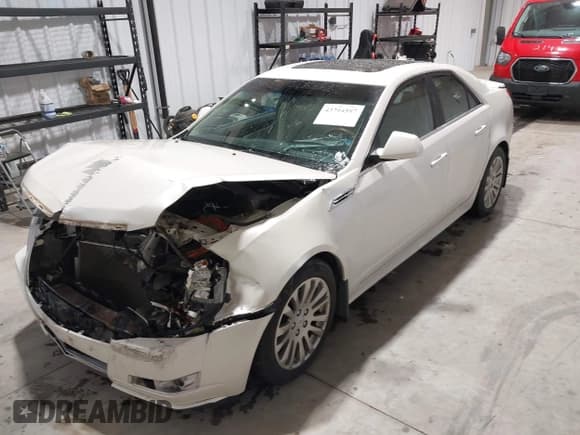 ✅ 2010 Cadillac CTS • VIN: 1G6DM5EV1A0116027 • Lot: 43794597. Listed on IAAI with 79,374 mi. Free auction sales archive from the USA and detailed vehicle history report at DreamBid. Image 2.