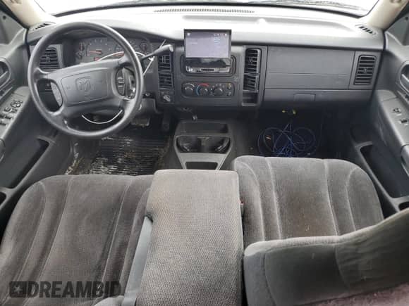 2003 Dodge Dakota SLT z VIN 1D7HG48N43S267503, wystawiony jako Copart lot #73586474 z przebiegiem 143 042 mil mil oraz Szkoda całkowita • Salvage title. Historia ofert i sprzedaży dostępna na DreamBid. Obrazek 8.