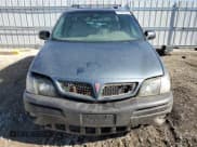 ✅ 2004 Pontiac Montana 1SA • VIN: 1GMDX03E64D262569 • Lot: 51320305. Wystawiony na Copart z przebiegiem Nie podano. Bezpłatny archiwum sprzedaży aukcyjnych z USA i szczegółowy raport historii pojazdu na DreamBid. Zdjęcie 5.